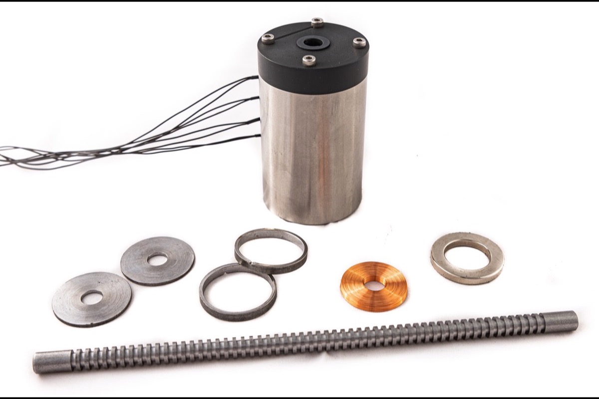 Disassembled electromagnetic actuator with coil and rack